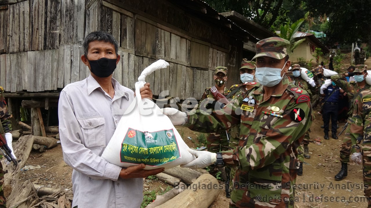 Members of Army distribute relief from their ration in Rangamati